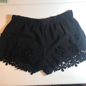 Black lace-trimmed shorts